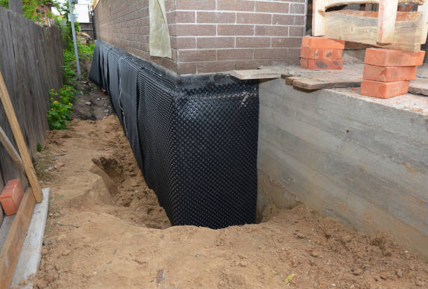 Happy homeowners after waterproofing job in Mount Orab